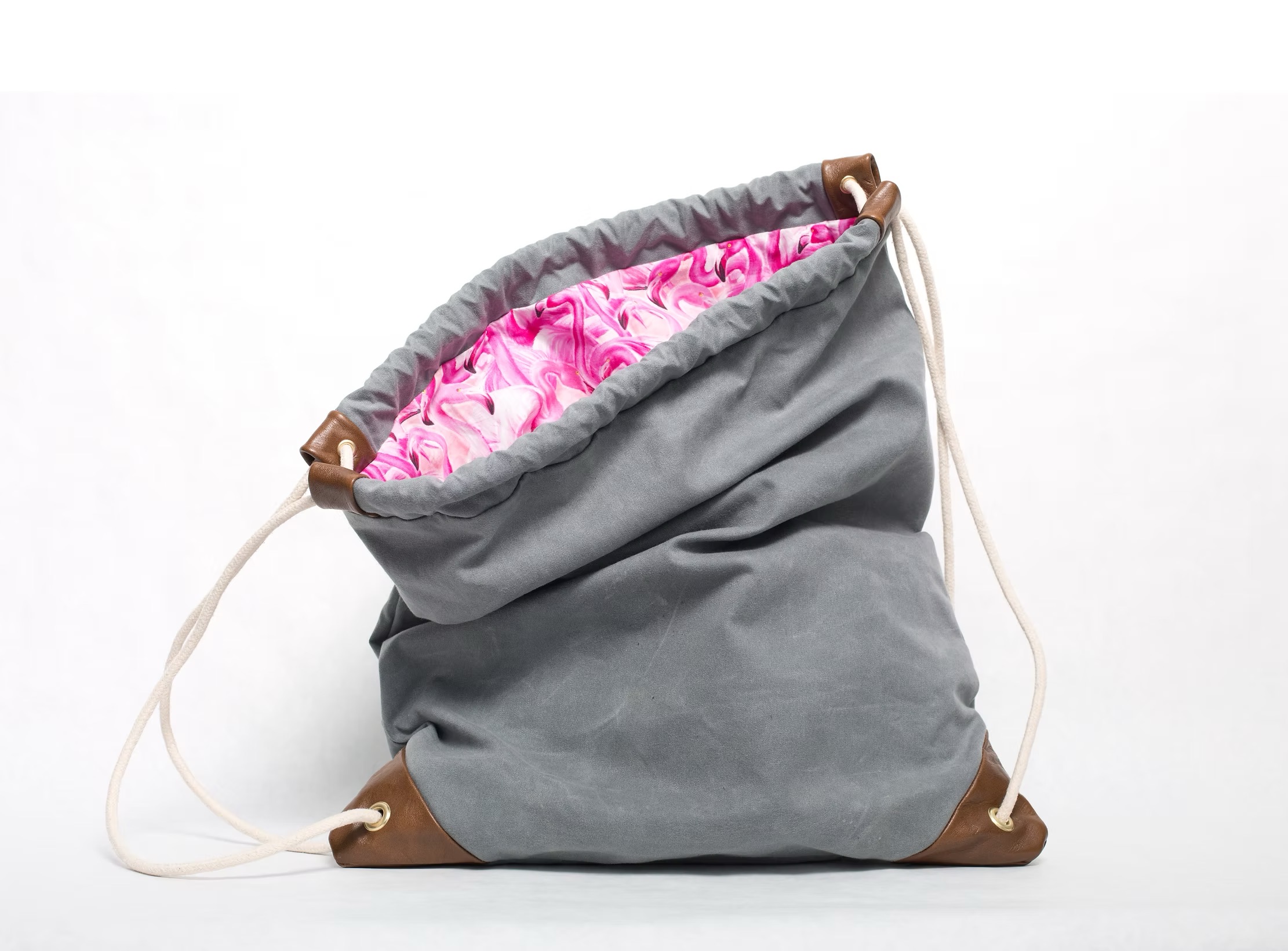 kingsland grey waxed canvas drawstring bag with pink flamingo lining handmade in brooklyn
