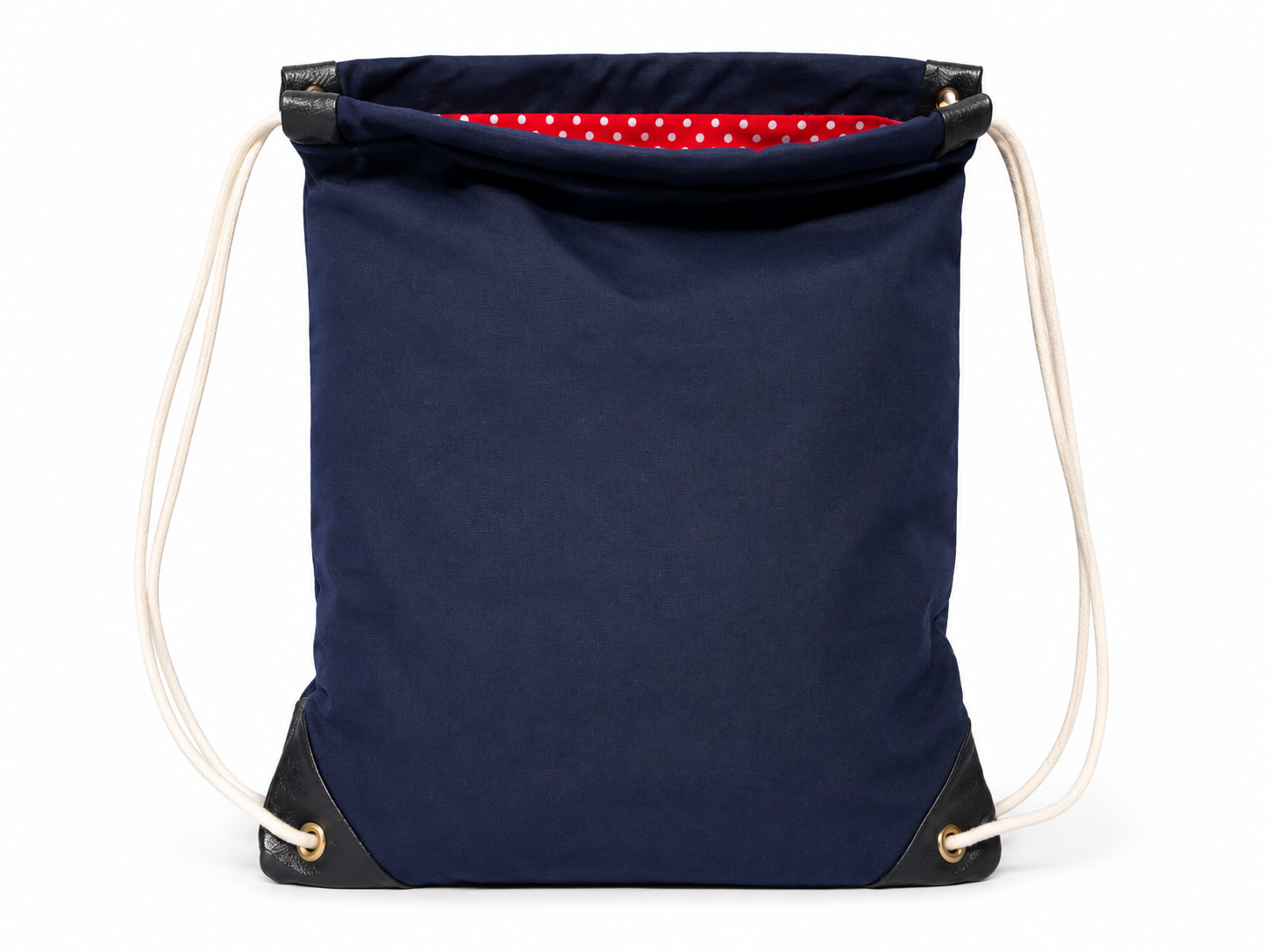 myrtle navy waxed canvas drawstring bag with red polka dot lining handmade in brooklyn